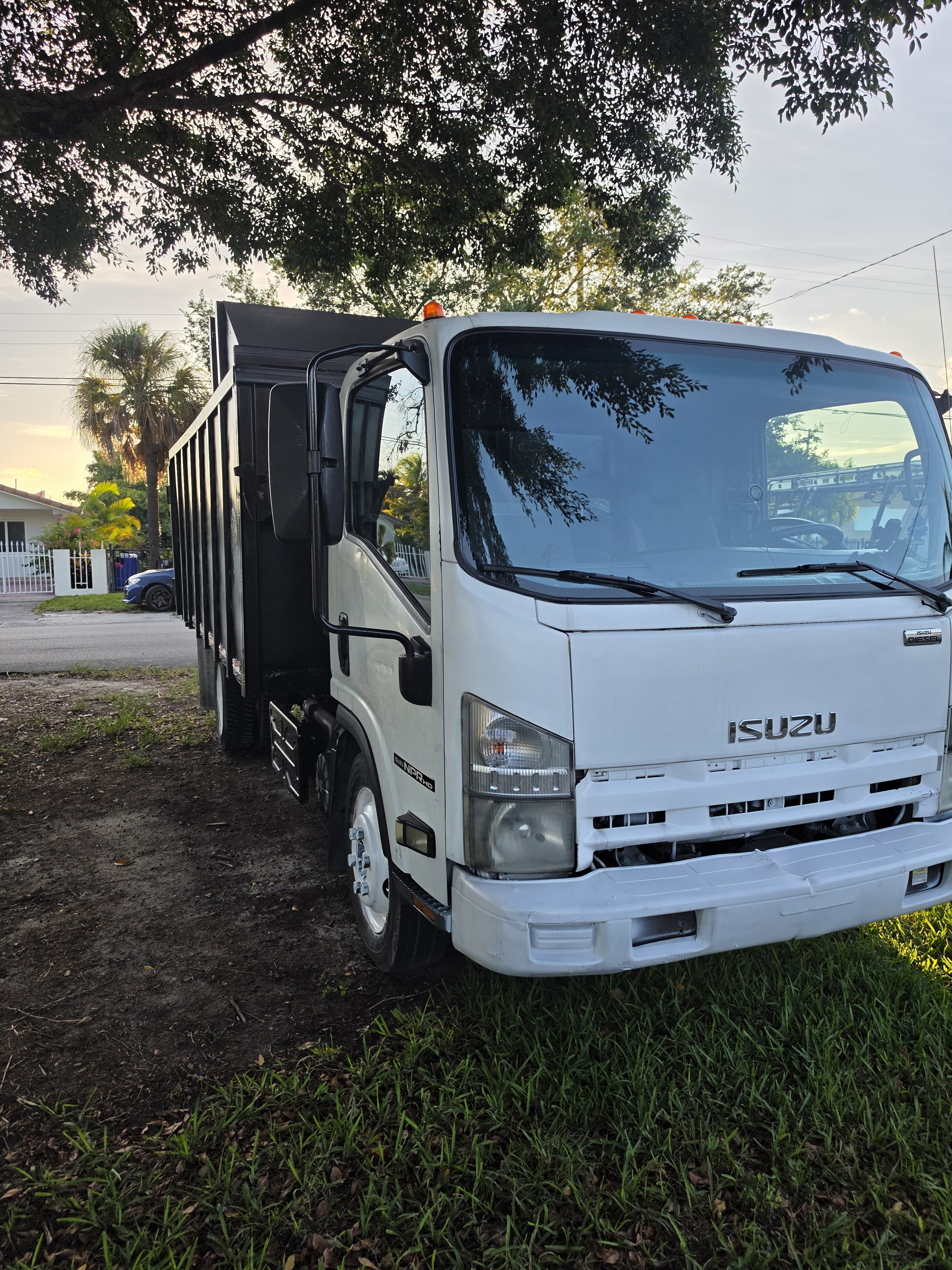 Salazar Pro Services Isuzu truck side view